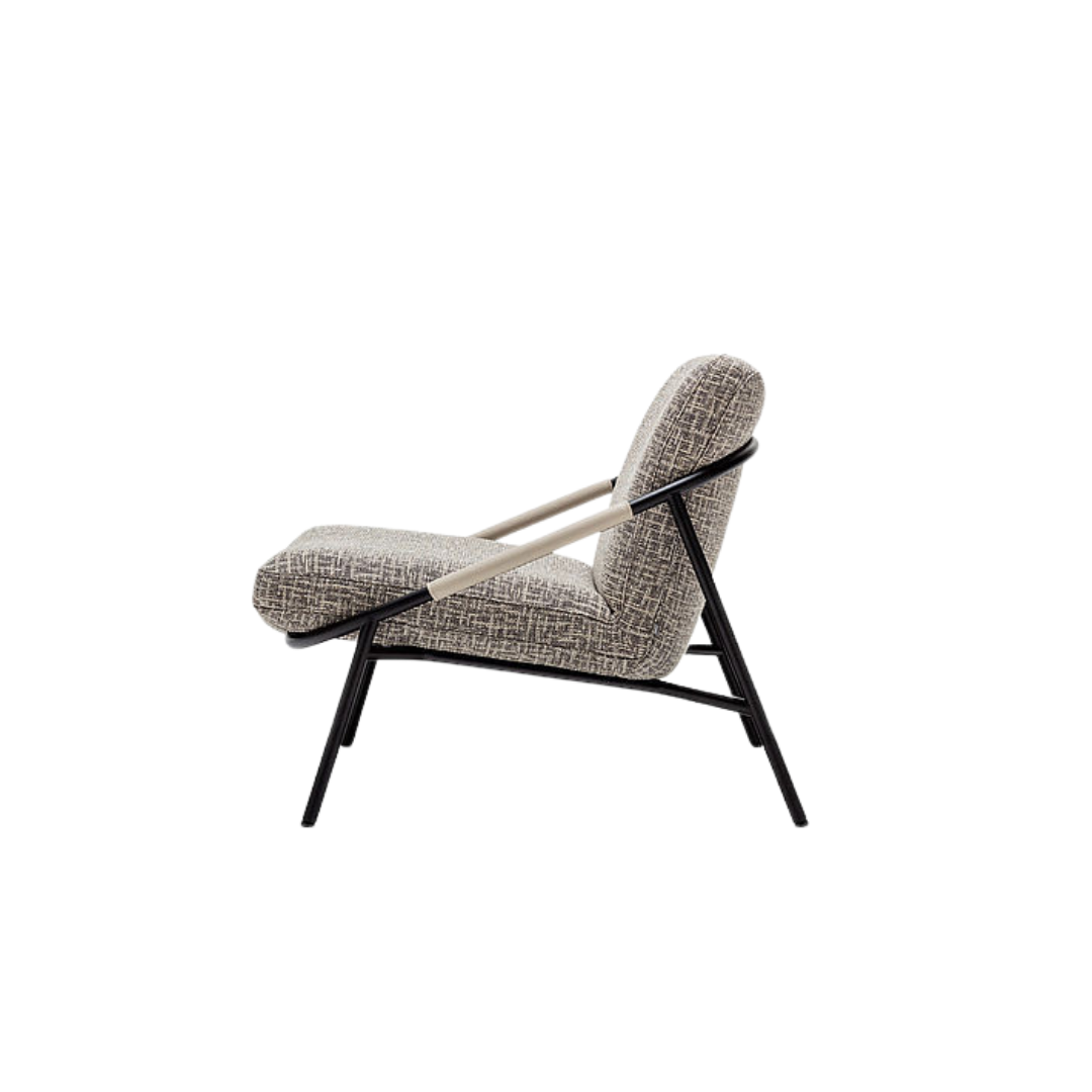 Luxury lounge armchair from Royal Interiors Singapore — designer seating crafted for modern comfort and timeless style.