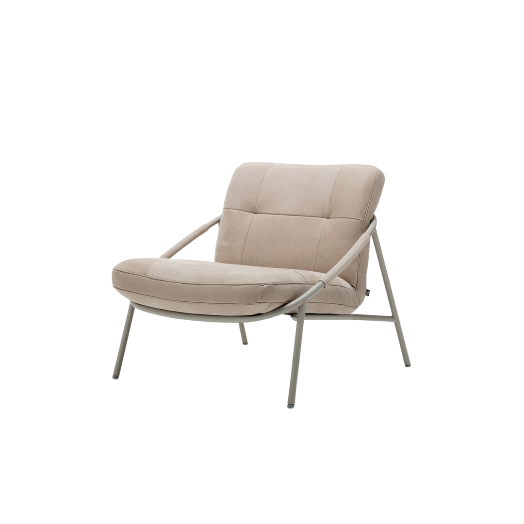 Luxury lounge armchair from Royal Interiors Singapore — designer seating crafted for modern comfort and timeless style.