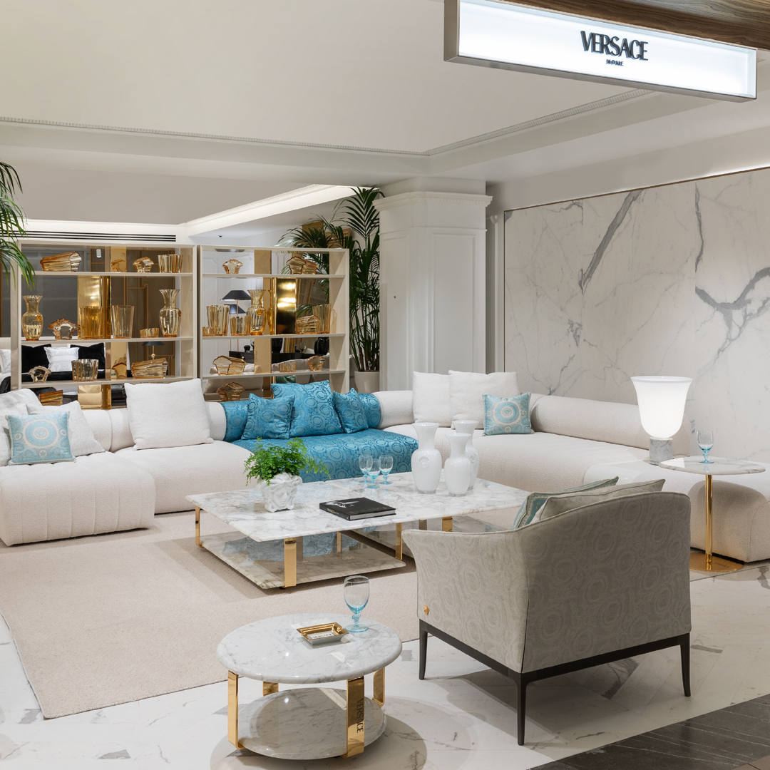 Versace Home furniture with signature Medusa and La Greca detailing, available at Royal Interiors Singapore.