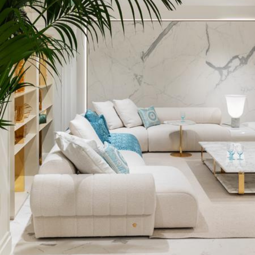 Versace Home furniture with signature Medusa and La Greca detailing, available at Royal Interiors Singapore.