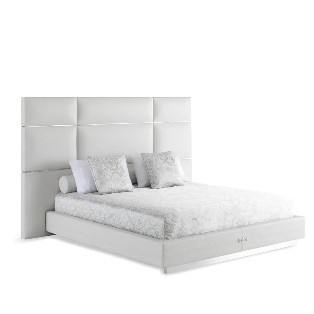 Versace Home furniture with signature Medusa and La Greca detailing, available at Royal Interiors Singapore.