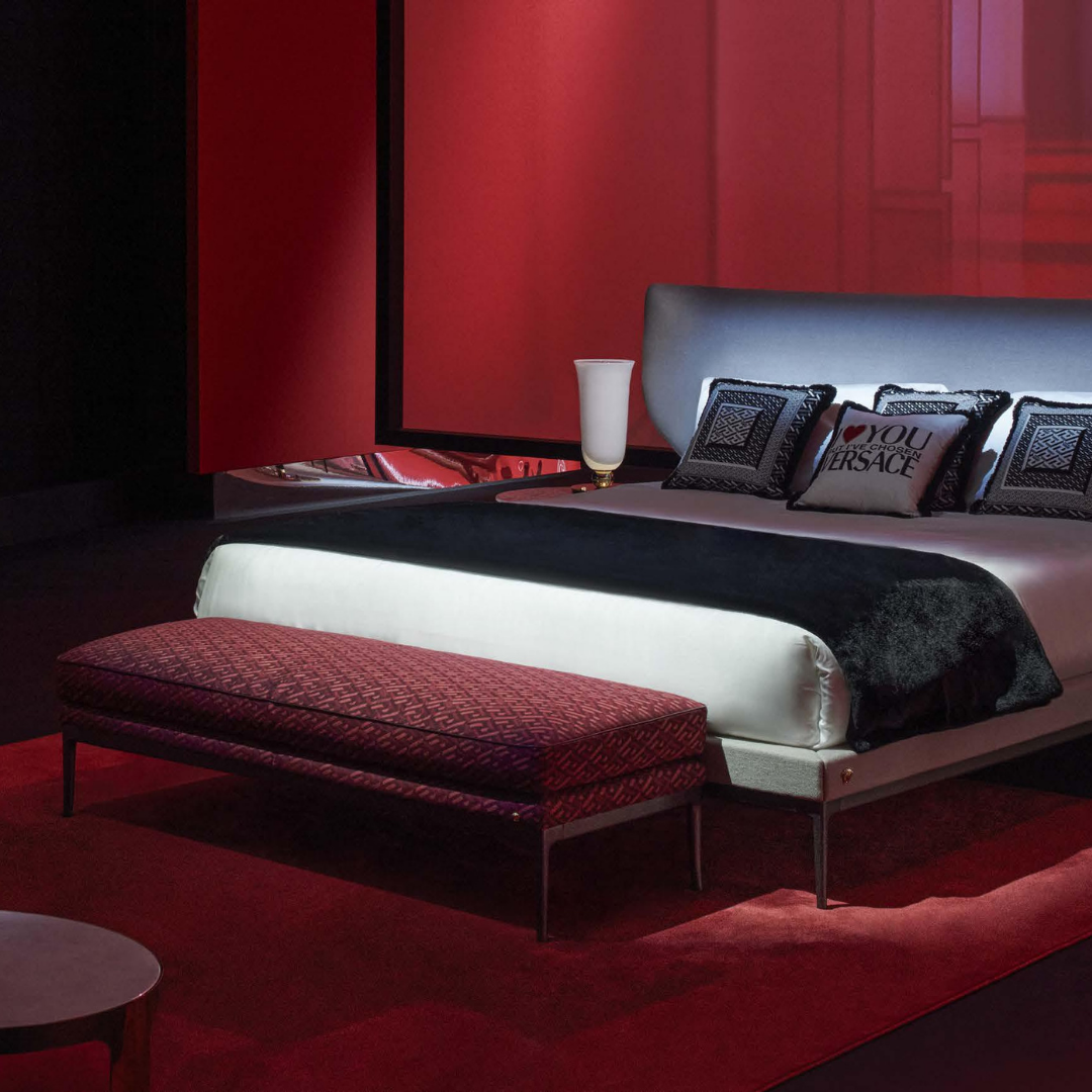 Versace Home furniture with signature Medusa and La Greca detailing, available at Royal Interiors Singapore.