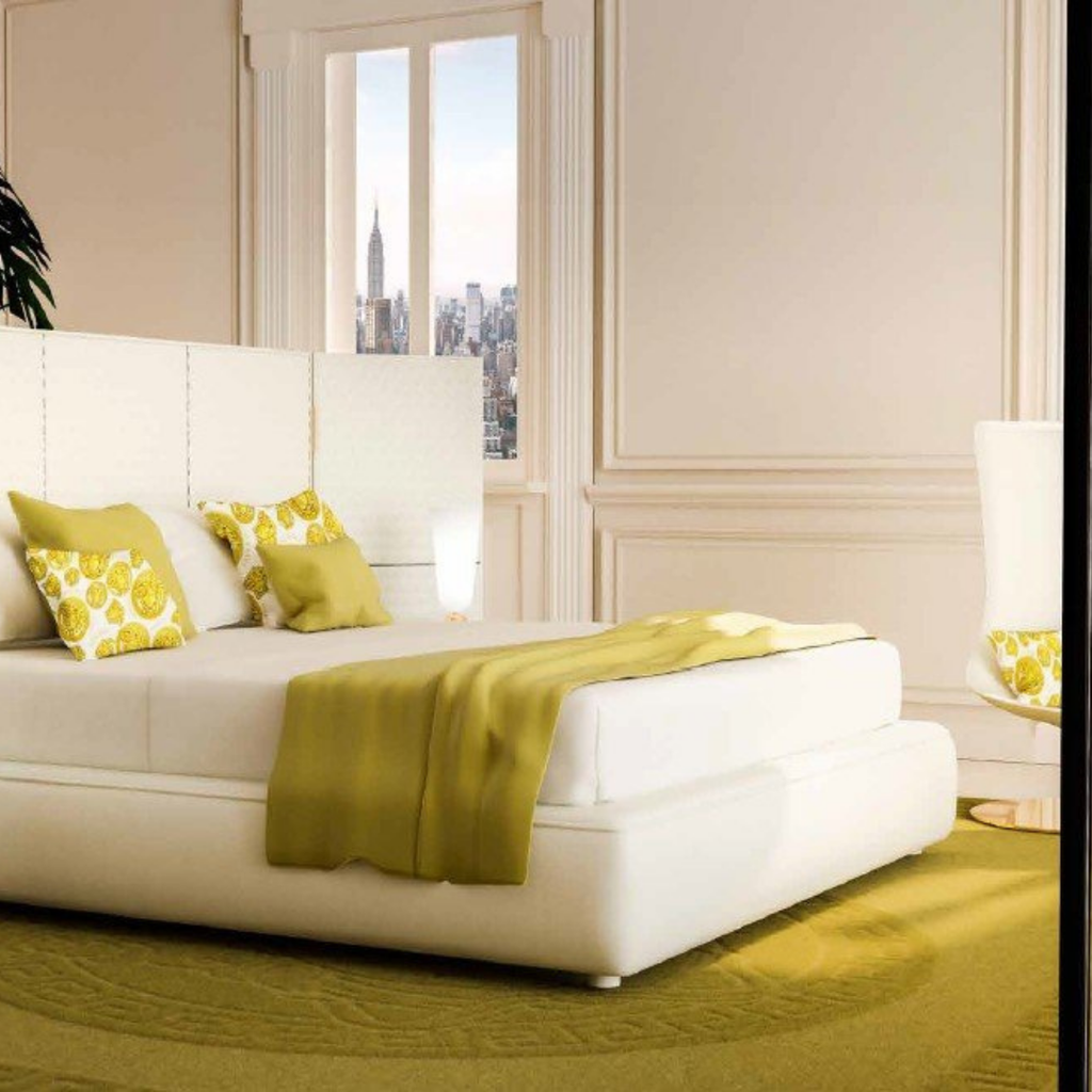 Versace Home furniture with signature Medusa and La Greca detailing, available at Royal Interiors Singapore.