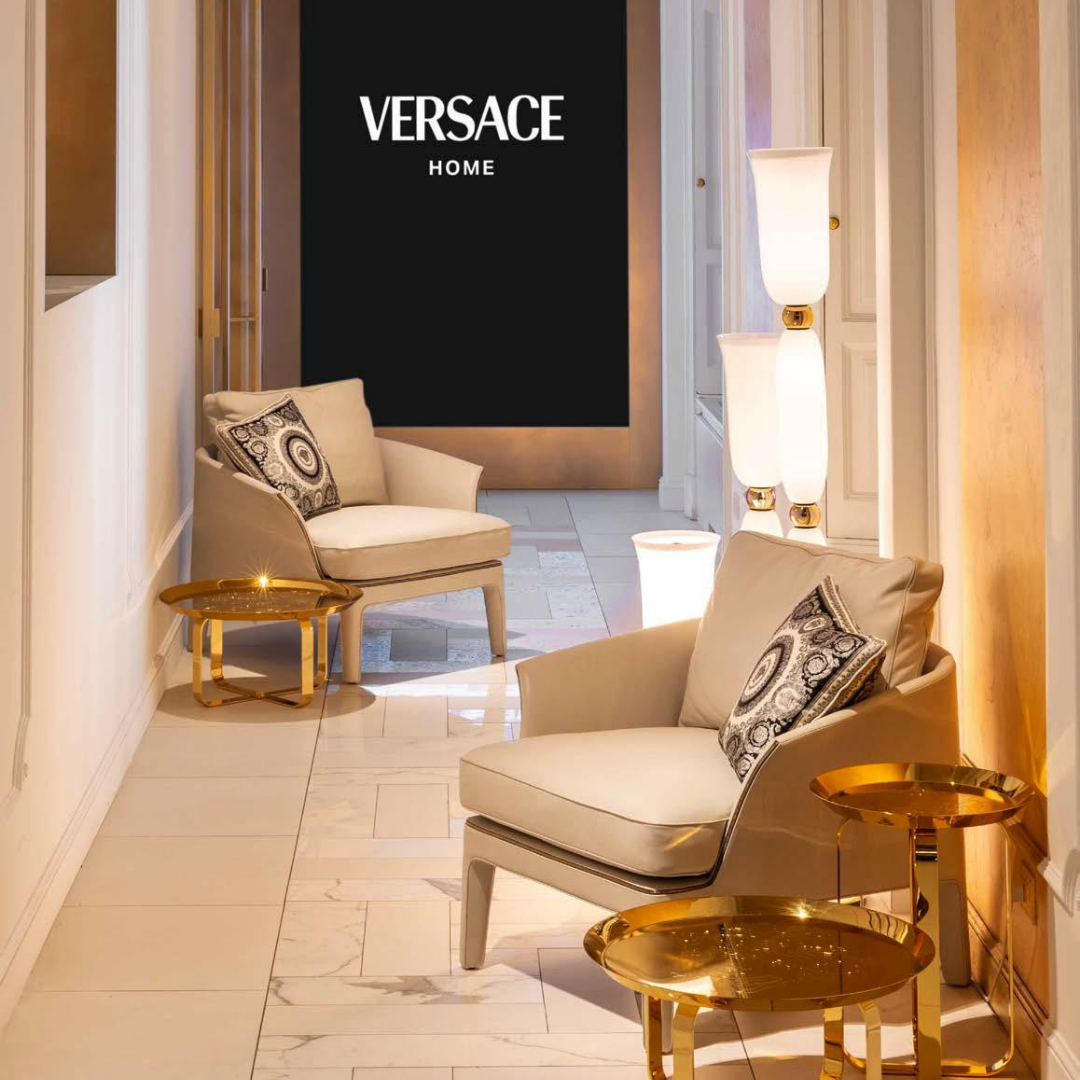Versace Home furniture with signature Medusa and La Greca detailing, available at Royal Interiors Singapore.