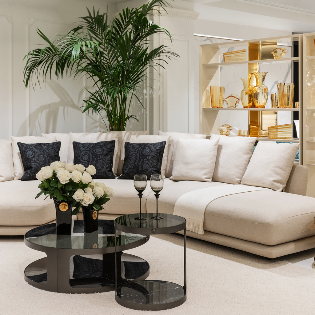 Versace Home furniture with signature Medusa and La Greca detailing, available at Royal Interiors Singapore.