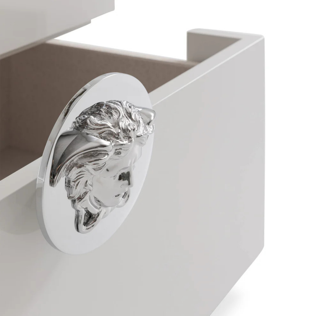 Versace Home furniture with signature Medusa and La Greca detailing, available at Royal Interiors Singapore.