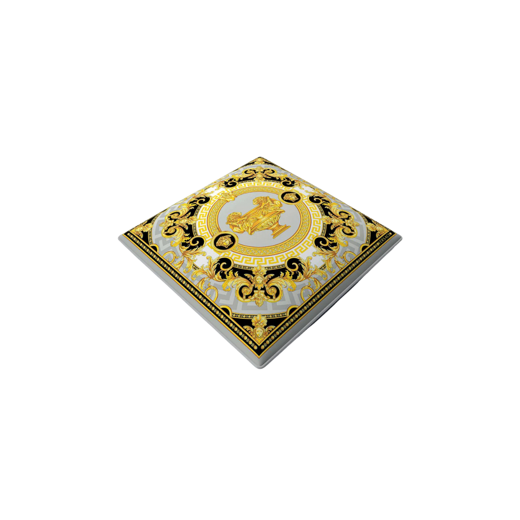 Versace Home furniture with signature Medusa and La Greca detailing, available at Royal Interiors Singapore.