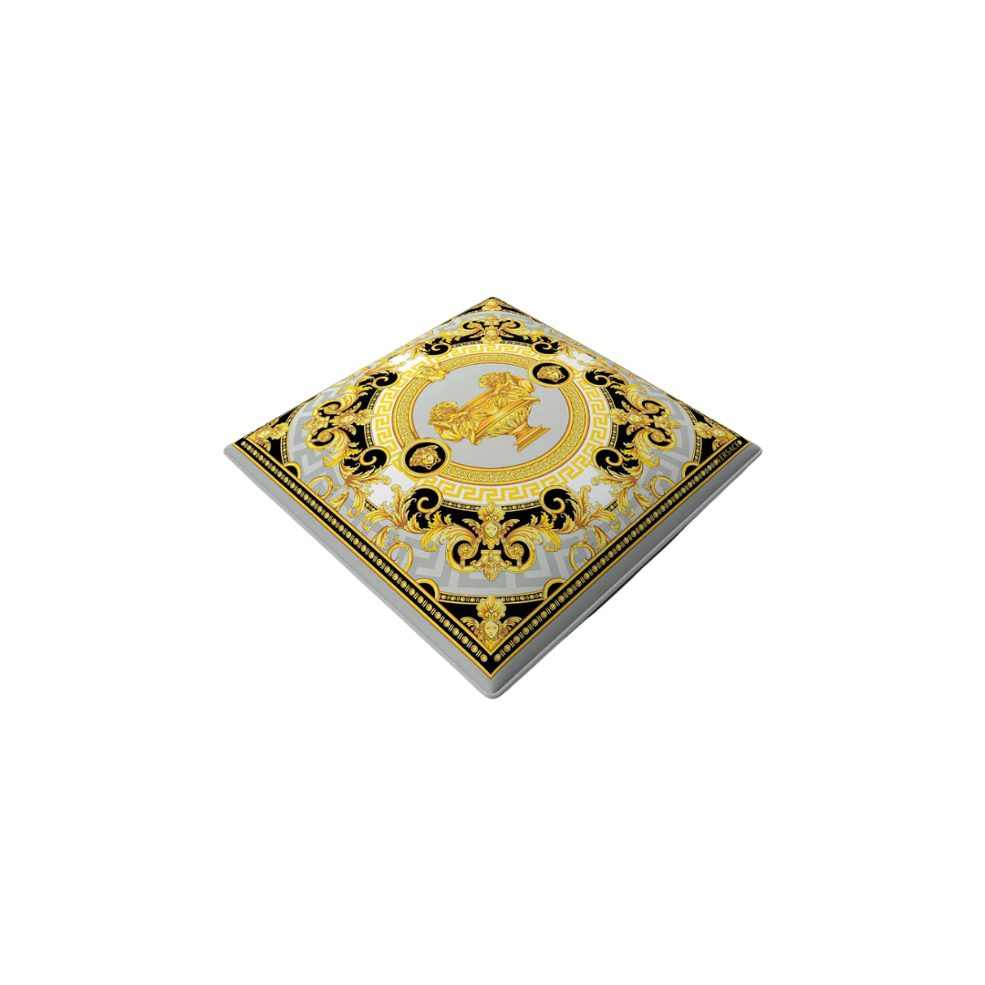 Versace Home furniture with signature Medusa and La Greca detailing, available at Royal Interiors Singapore.