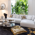 Versace Home furniture with signature Medusa and La Greca detailing, available at Royal Interiors Singapore.