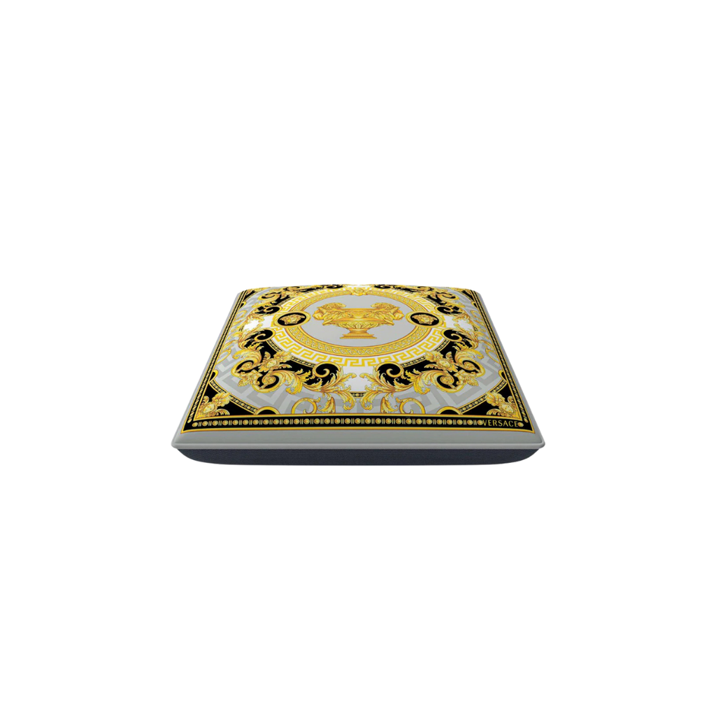 Versace Home furniture with signature Medusa and La Greca detailing, available at Royal Interiors Singapore.