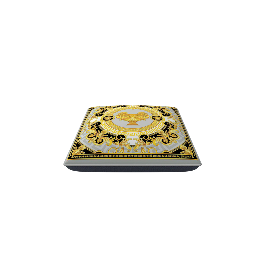 Versace Home furniture with signature Medusa and La Greca detailing, available at Royal Interiors Singapore.