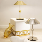 Versace Home furniture with signature Medusa and La Greca detailing, available at Royal Interiors Singapore.