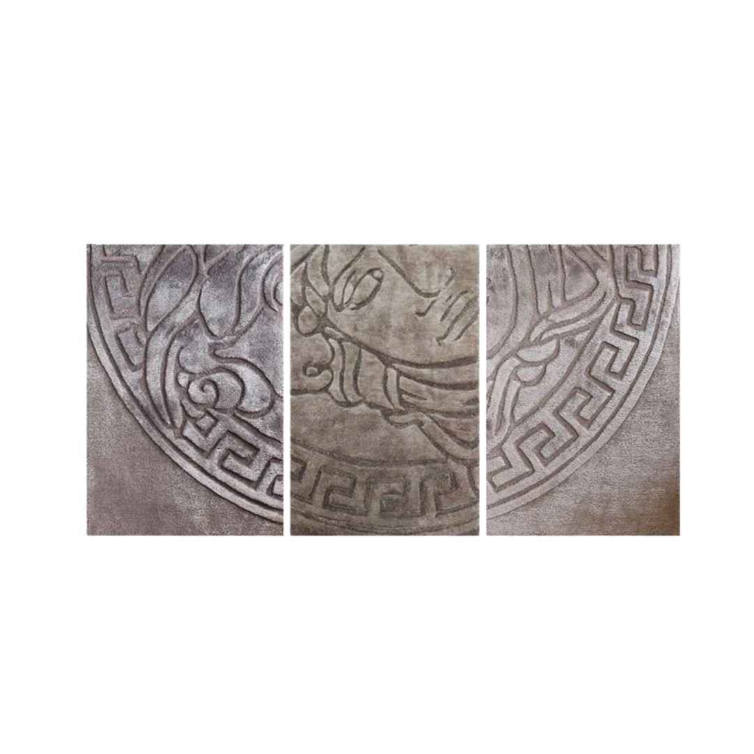 Versace Home furniture with signature Medusa and La Greca detailing, available at Royal Interiors Singapore.