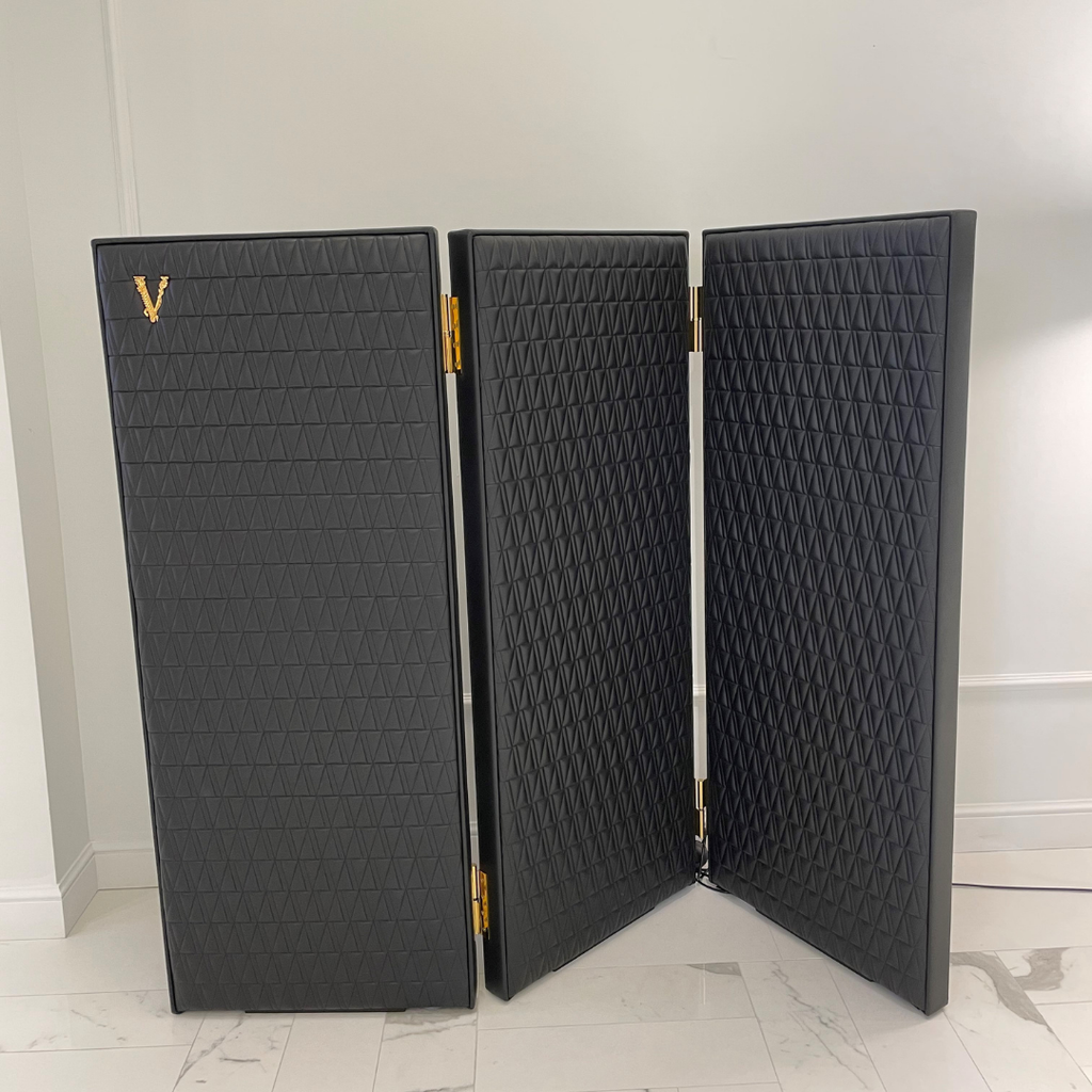 Versace Home furniture with signature Medusa and La Greca detailing, available at Royal Interiors Singapore.