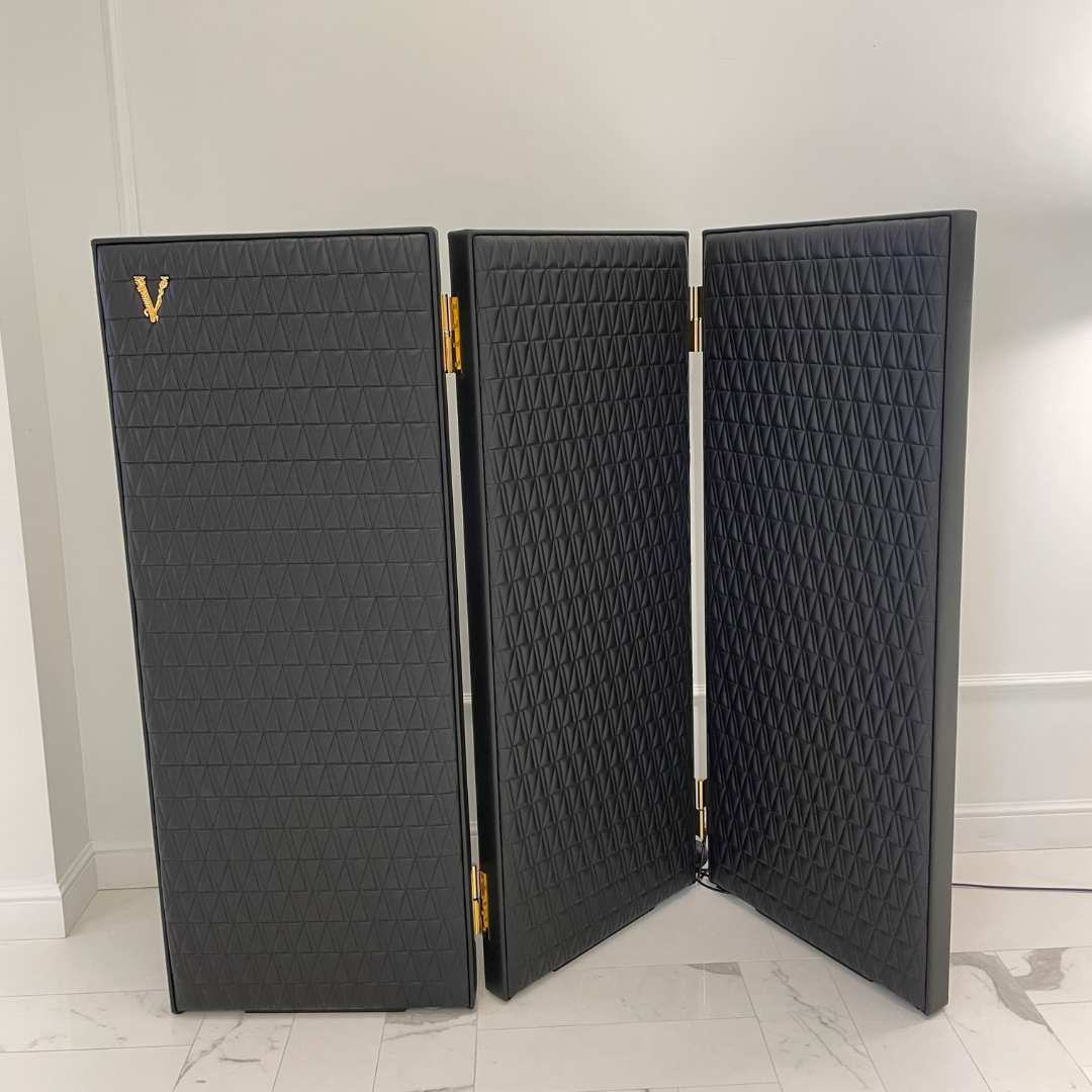 Versace Home furniture with signature Medusa and La Greca detailing, available at Royal Interiors Singapore.