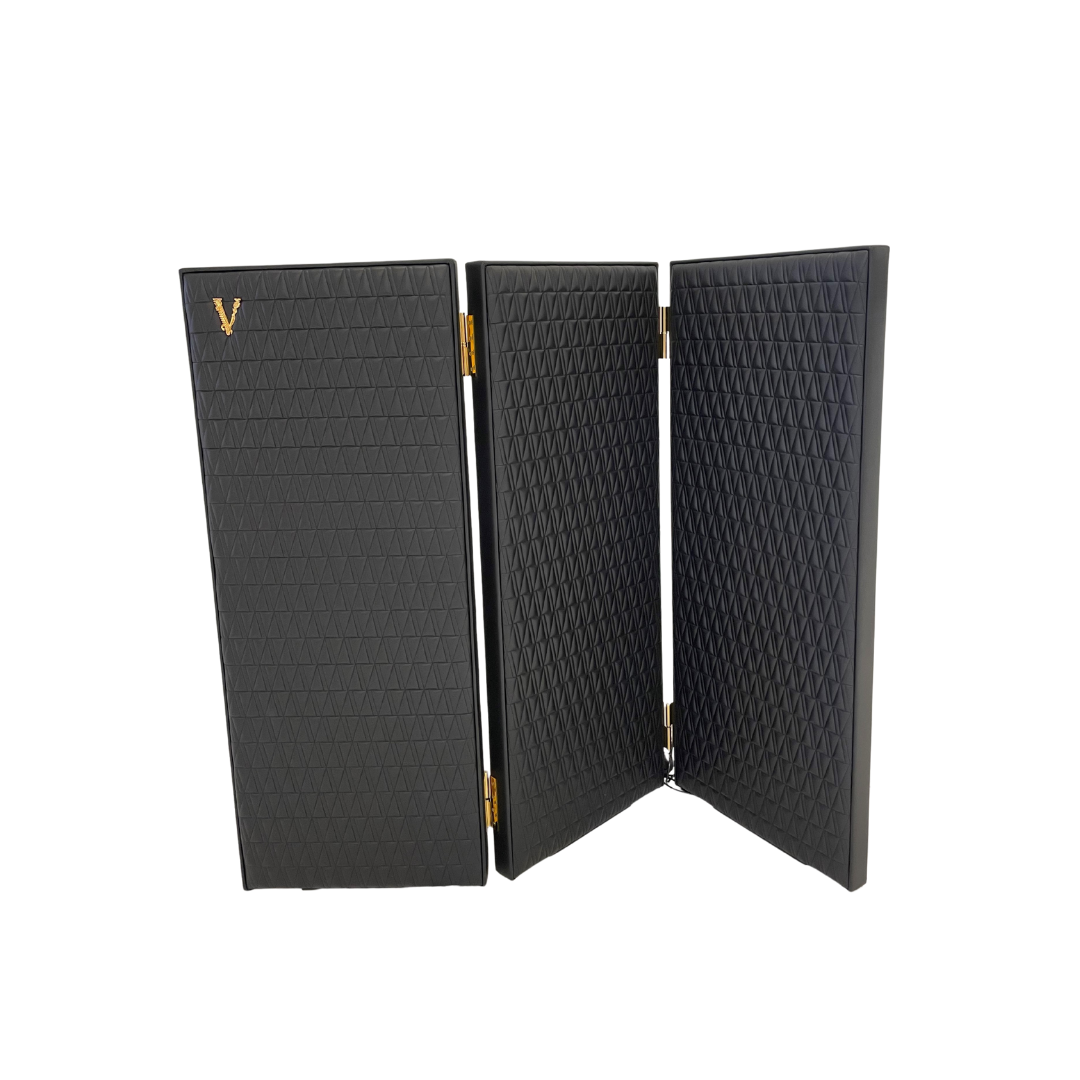 Versace Home furniture with signature Medusa and La Greca detailing, available at Royal Interiors Singapore.