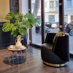 Versace Home furniture with signature Medusa and La Greca detailing, available at Royal Interiors Singapore.