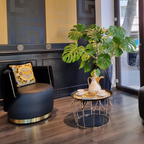 Versace Home furniture with signature Medusa and La Greca detailing, available at Royal Interiors Singapore.