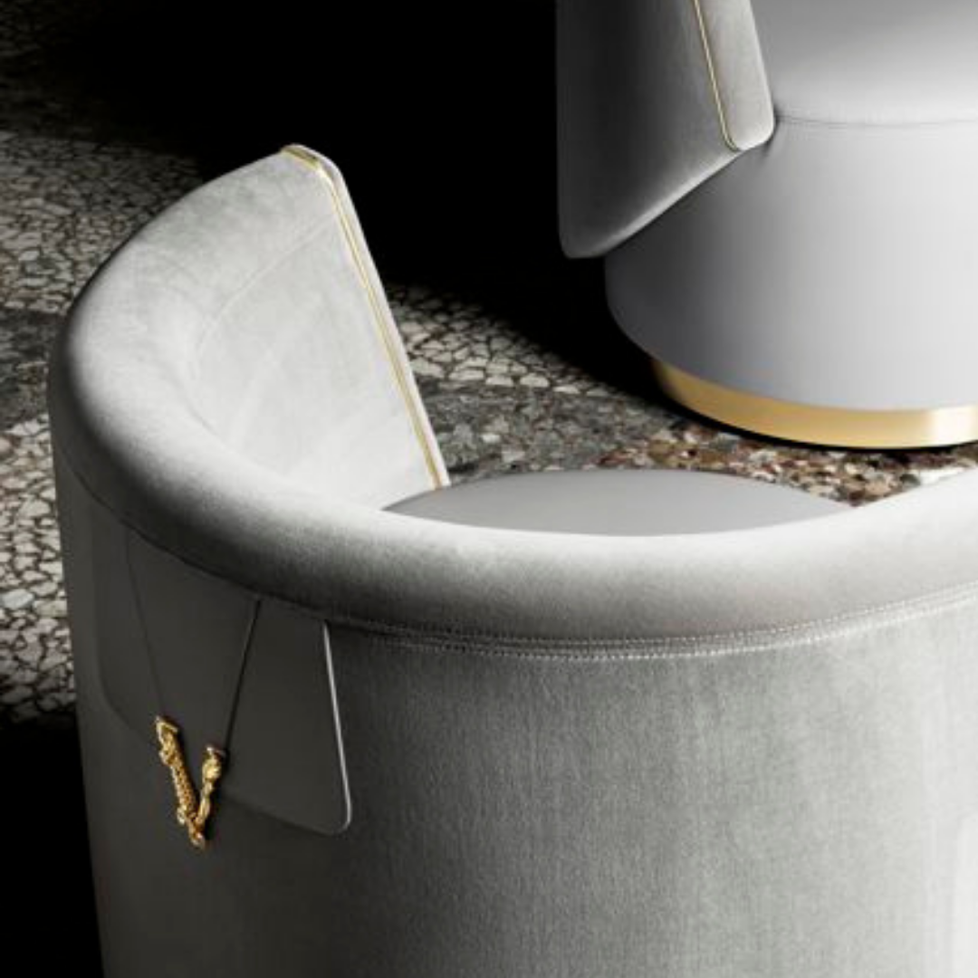 Versace Home furniture with signature Medusa and La Greca detailing, available at Royal Interiors Singapore.