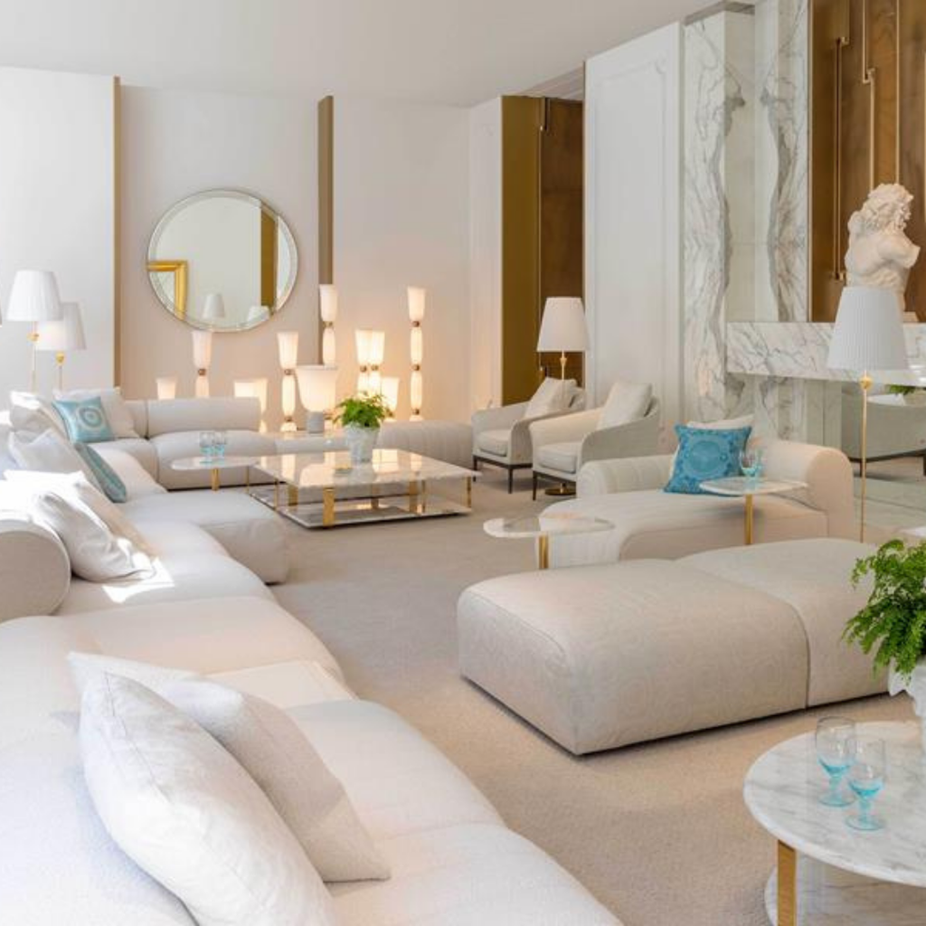 Versace Home furniture with signature Medusa and La Greca detailing, available at Royal Interiors Singapore.