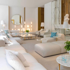 Versace Home furniture with signature Medusa and La Greca detailing, available at Royal Interiors Singapore.