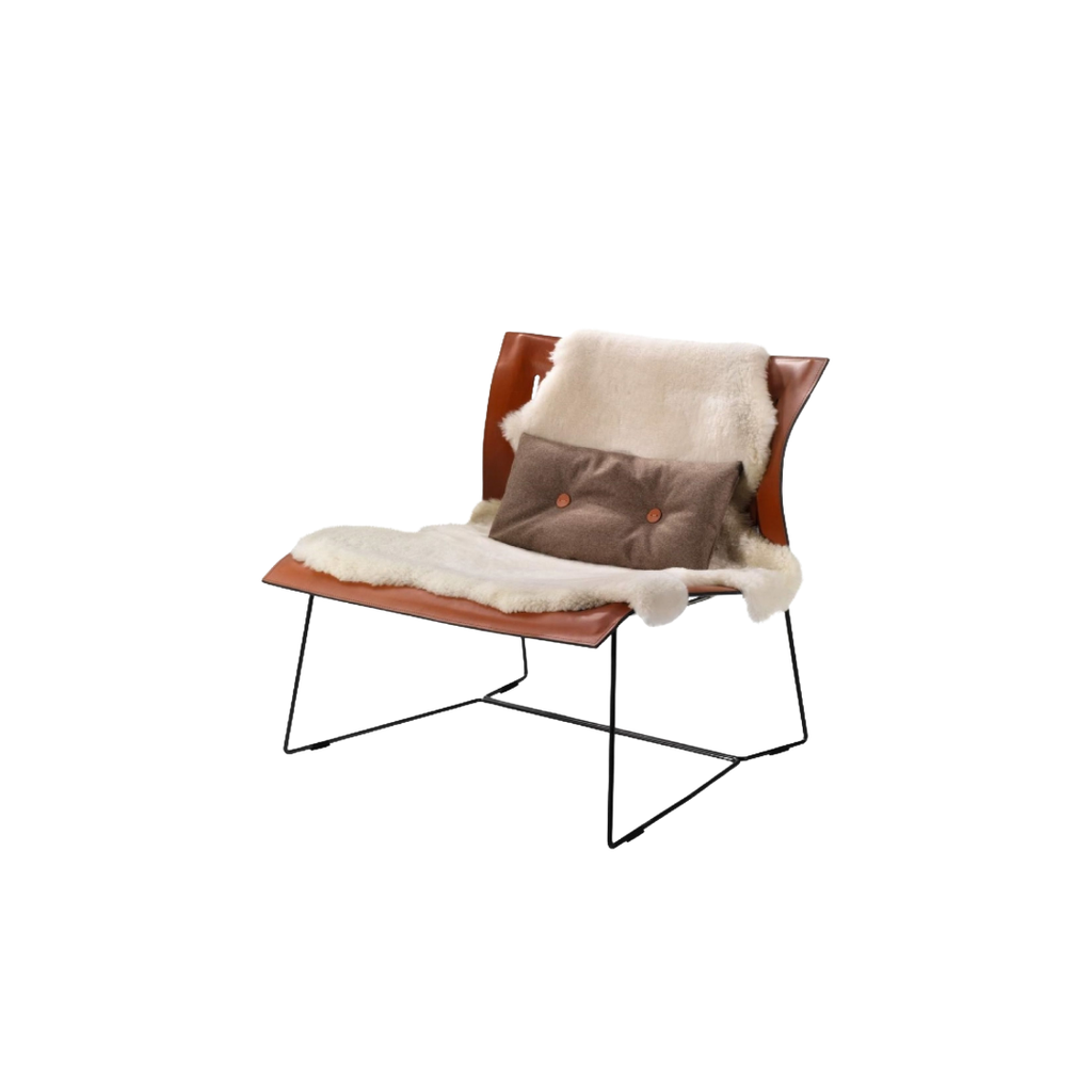 Luxury lounge armchair from Royal Interiors Singapore — designer seating crafted for modern comfort and timeless style.