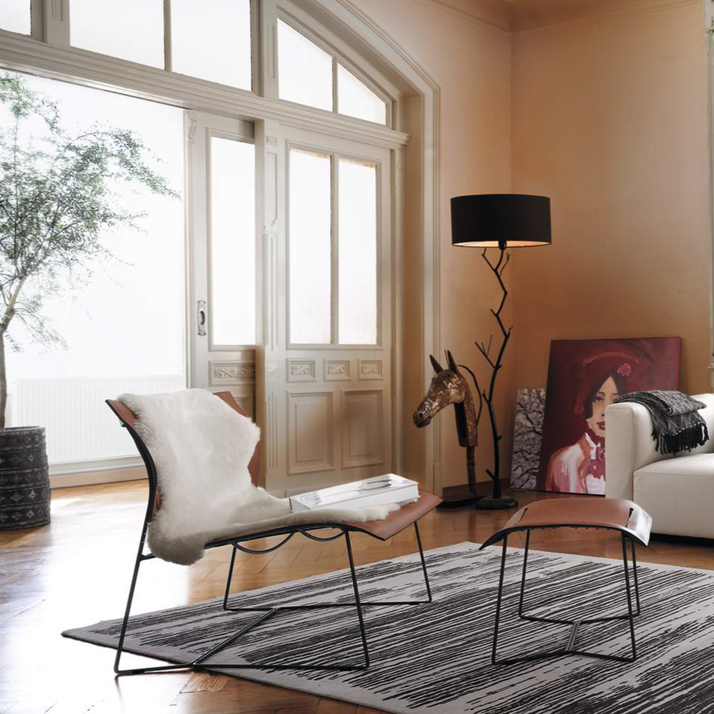 Luxury lounge armchair from Royal Interiors Singapore — designer seating crafted for modern comfort and timeless style.