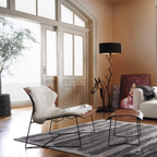 Luxury lounge armchair from Royal Interiors Singapore — designer seating crafted for modern comfort and timeless style.