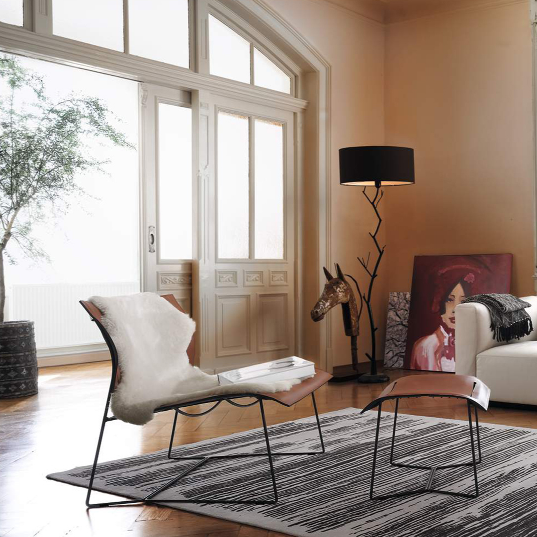 Luxury lounge armchair from Royal Interiors Singapore — designer seating crafted for modern comfort and timeless style.