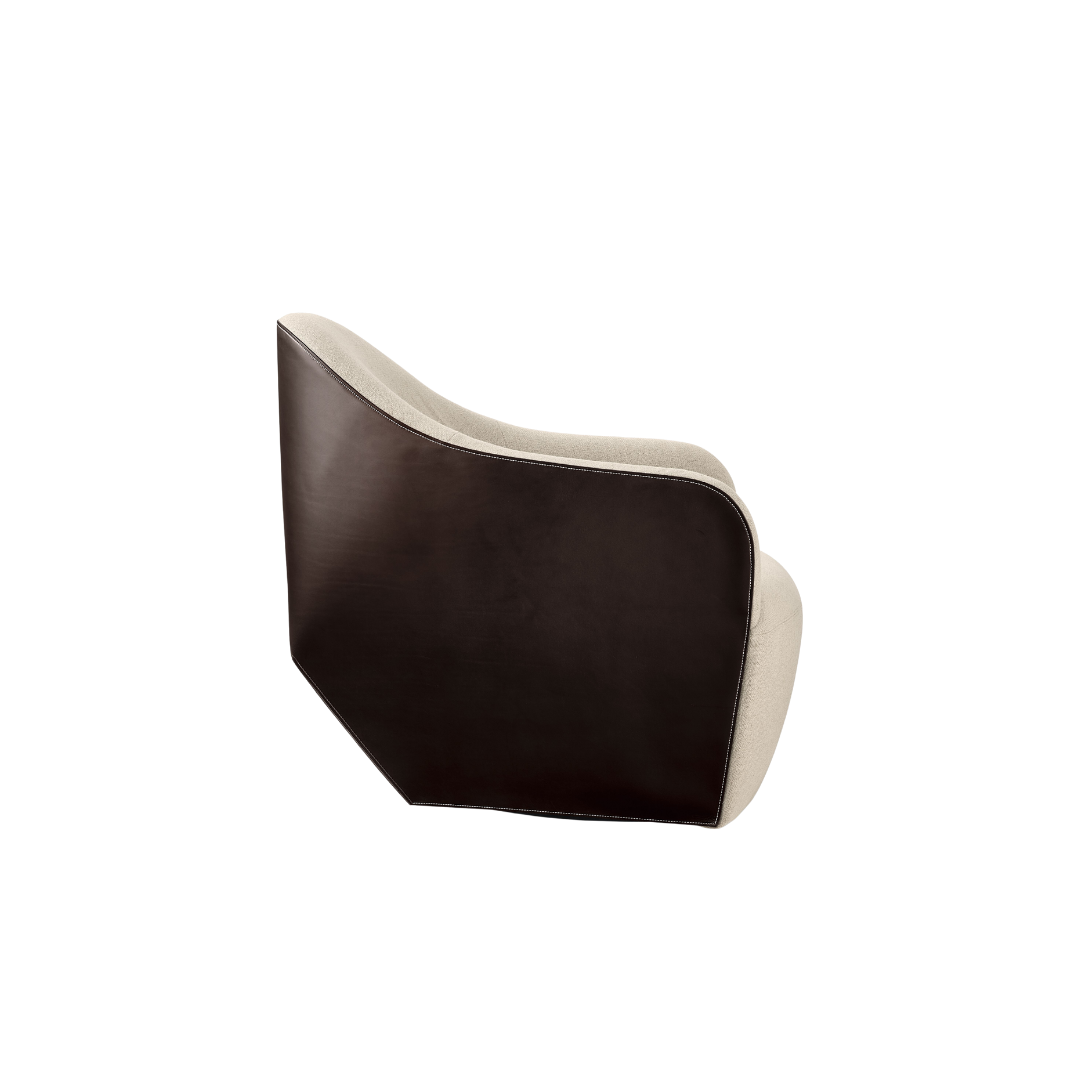 Luxury lounge armchair from Royal Interiors Singapore — designer seating crafted for modern comfort and timeless style.