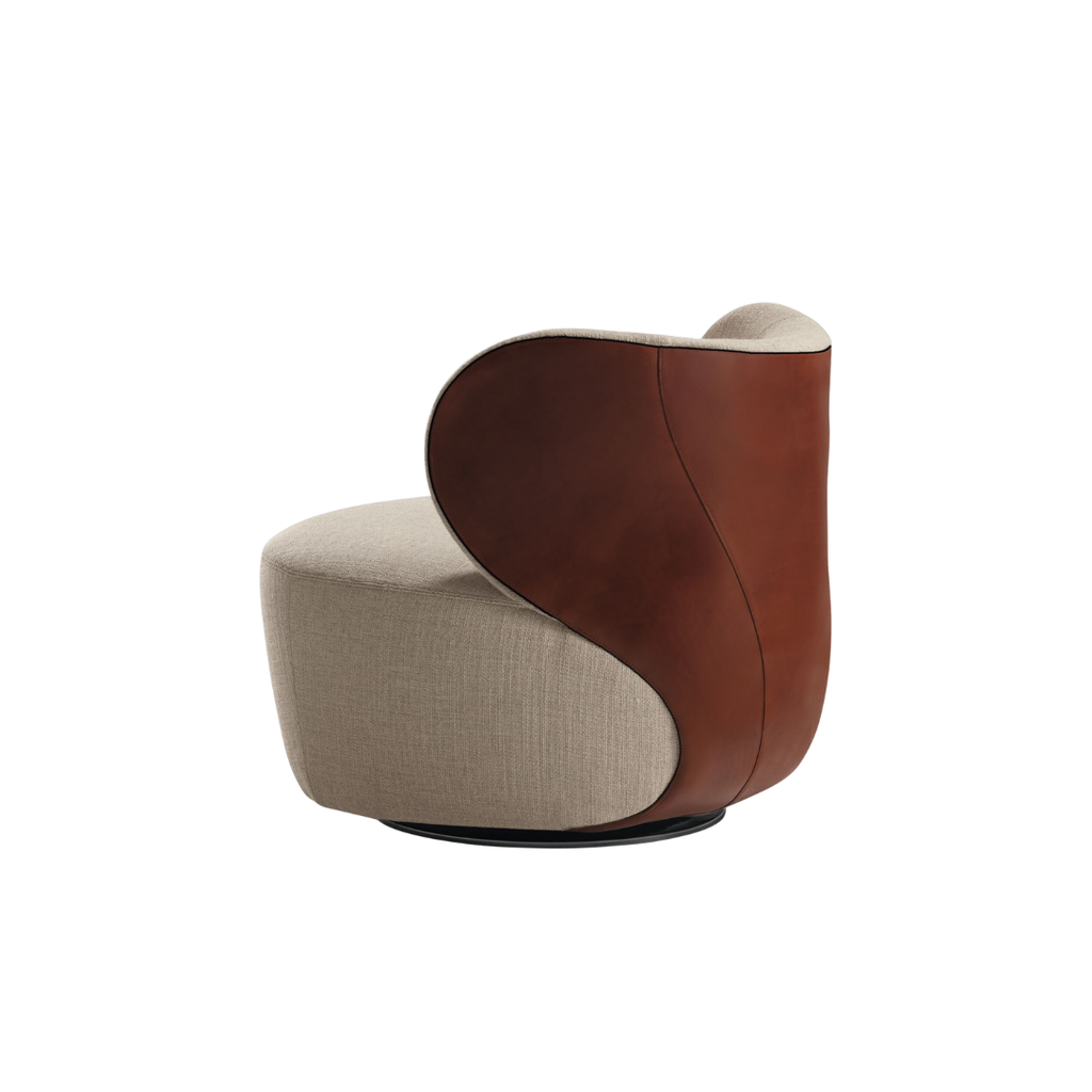 Luxury lounge armchair from Royal Interiors Singapore — designer seating crafted for modern comfort and timeless style.