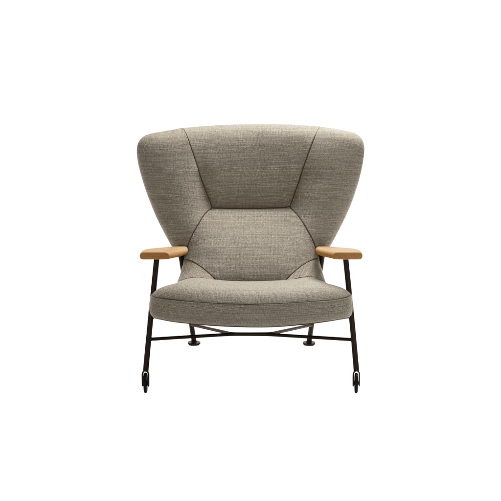 Luxury lounge armchair from Royal Interiors Singapore — designer seating crafted for modern comfort and timeless style.