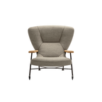 Luxury lounge armchair from Royal Interiors Singapore — designer seating crafted for modern comfort and timeless style.
