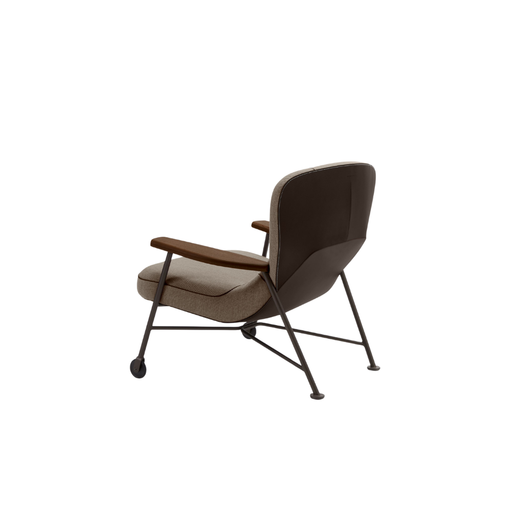 Luxury lounge armchair from Royal Interiors Singapore — designer seating crafted for modern comfort and timeless style.