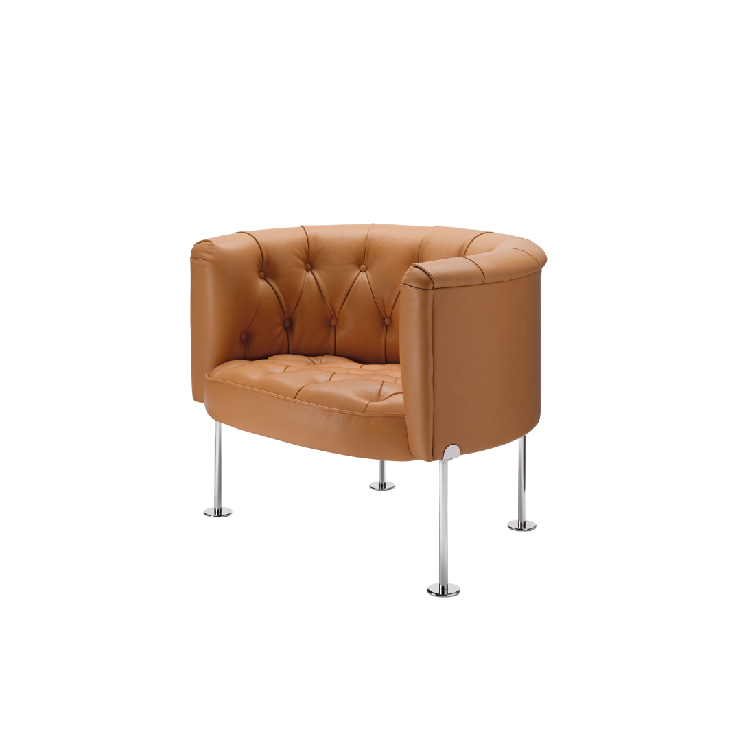 Luxury lounge armchair from Royal Interiors Singapore — designer seating crafted for modern comfort and timeless style.