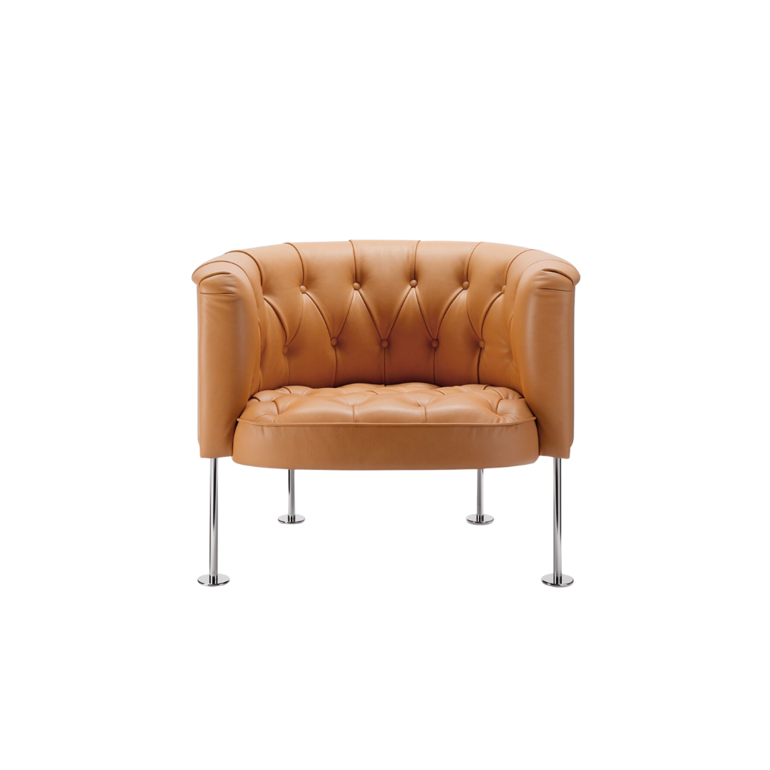 Luxury lounge armchair from Royal Interiors Singapore — designer seating crafted for modern comfort and timeless style.