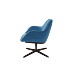 Luxury lounge armchair from Royal Interiors Singapore — designer seating crafted for modern comfort and timeless style.