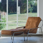 Luxury lounge armchair from Royal Interiors Singapore — designer seating crafted for modern comfort and timeless style.