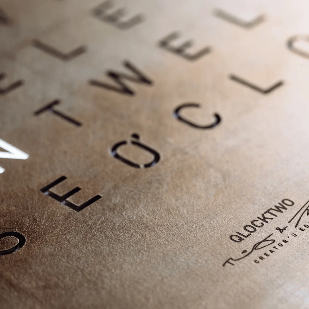 QLOCKTWO luxury word clock in contemporary interior setting, available at Royal Interiors Singapore